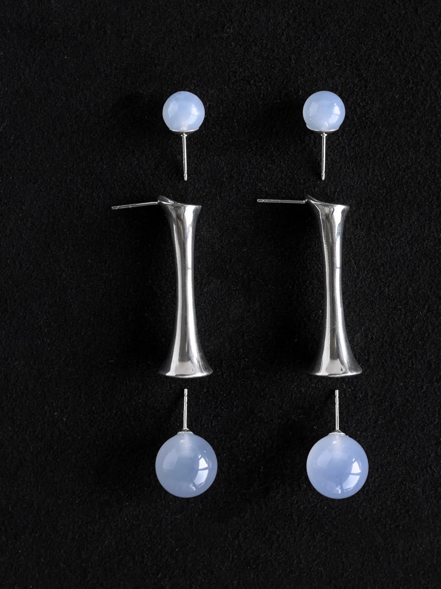 Maancy interchangeable drop earrings with chalcedony gemstones and sterling silver fluted design, front view against black background.