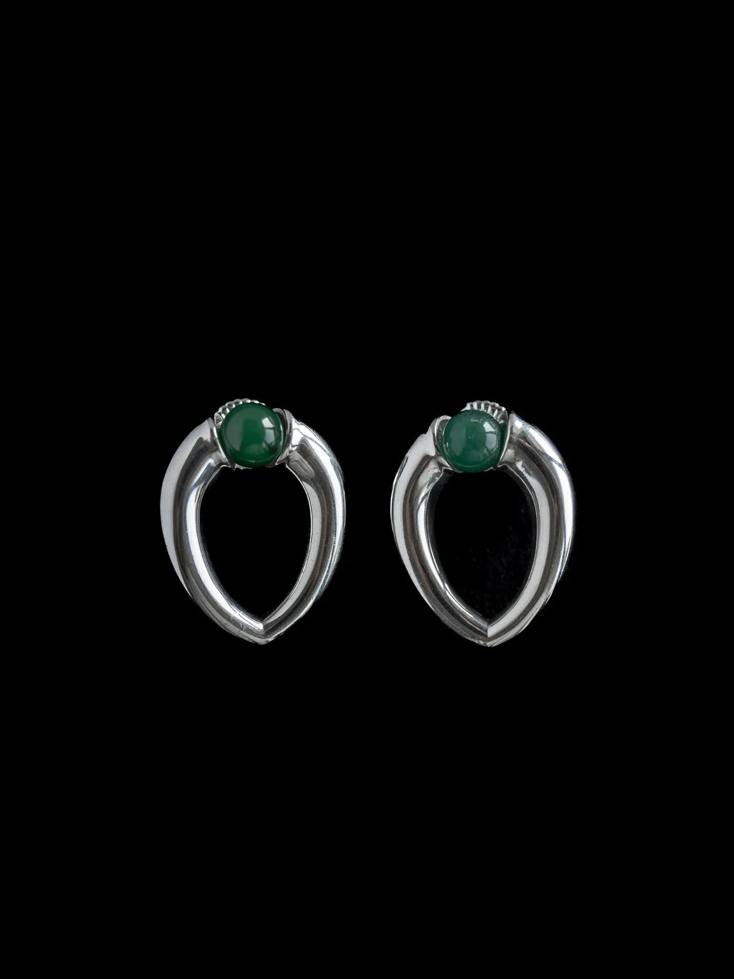 Maancy interchangeable teardrop earrings in polished sterling silver with vibrant green jade spheres, showcasing modernist open design.