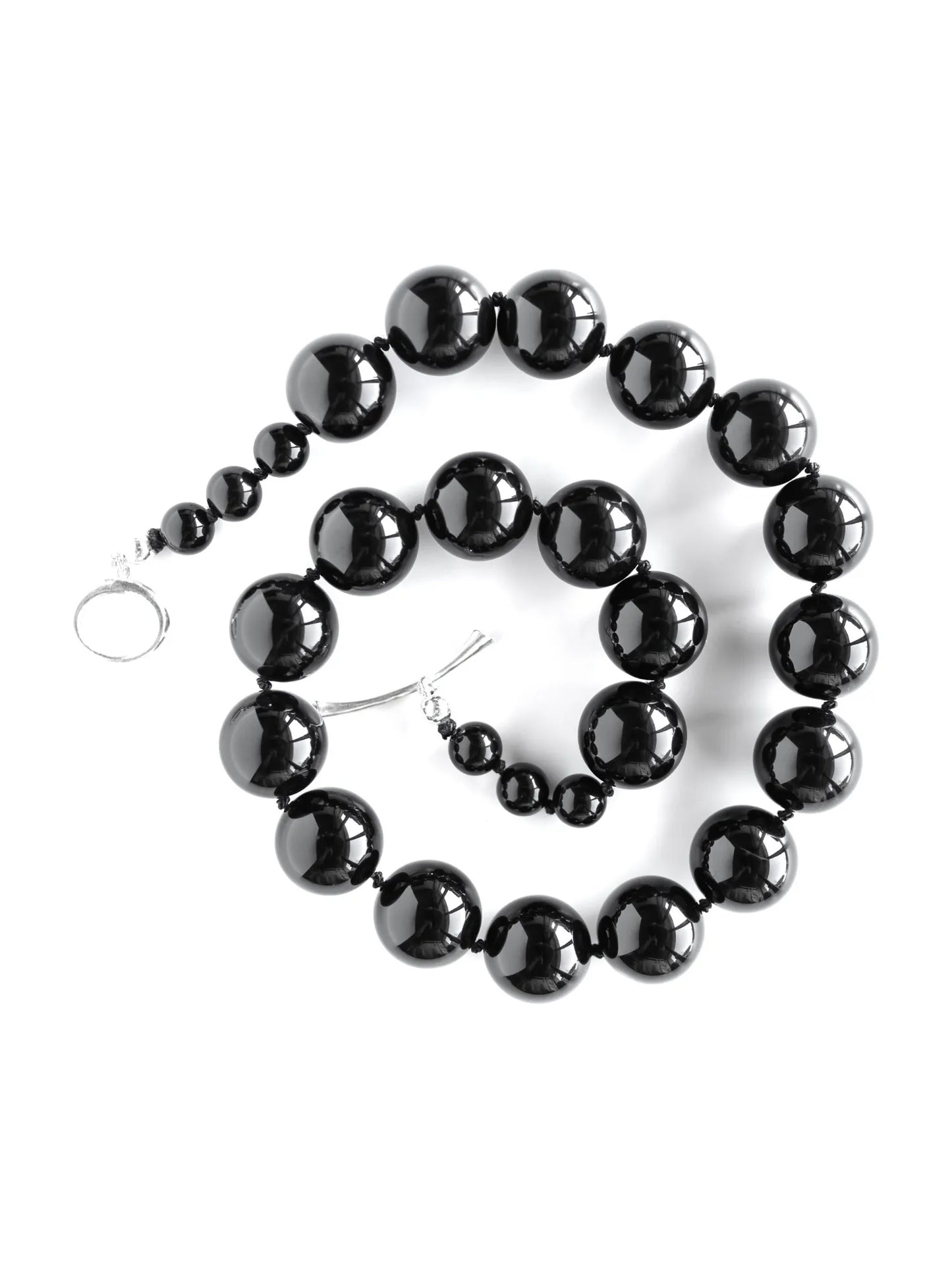 Complete Maancy black onyx Orb Collar necklace with sterling silver toggle clasp on white background, showing full graduated design.