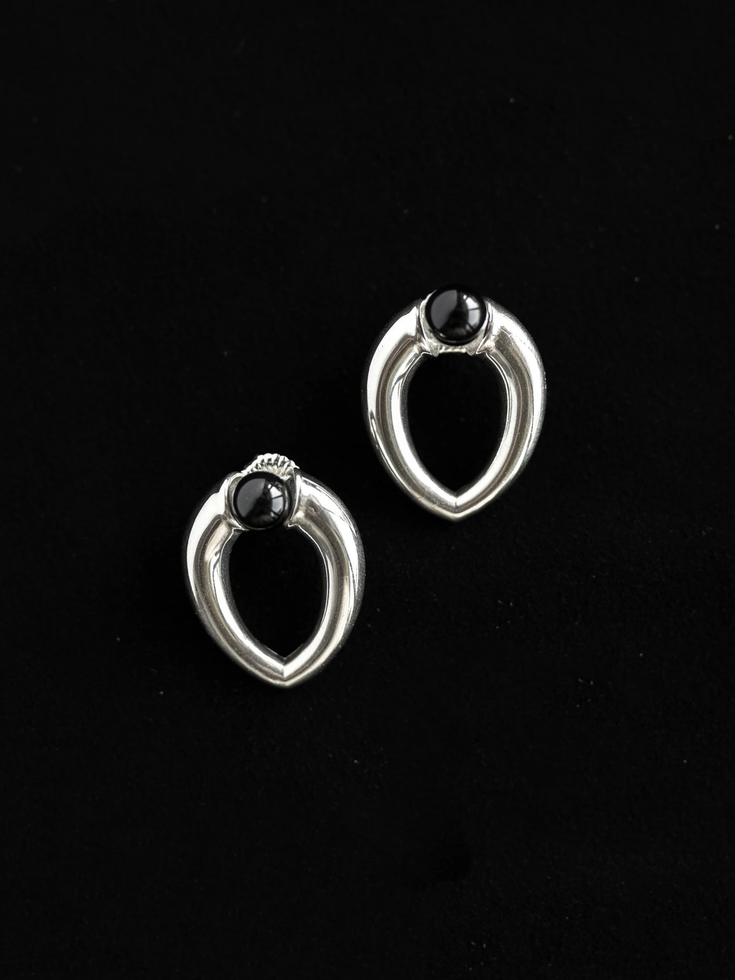 Maancy sterling silver teardrop stud earrings with onyx gemstones, designed as versatile 8mm studs compatible with interchangeable earring system.