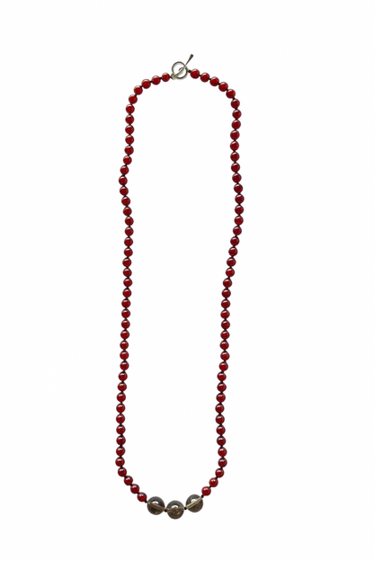 long beaded necklace with carnelian beads and center large smoky quartz beads