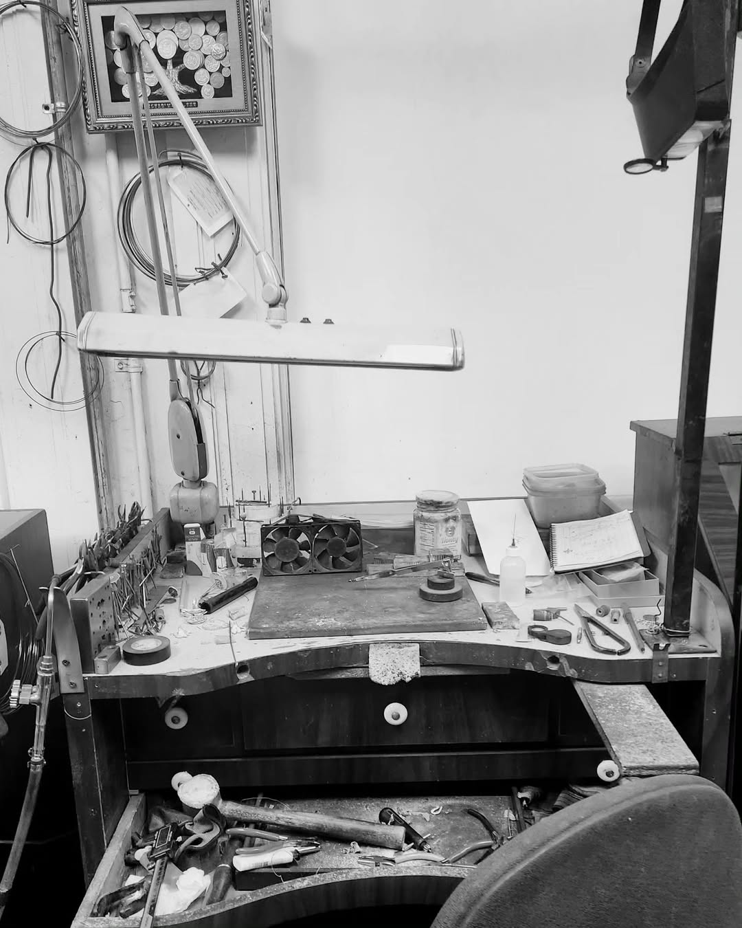 Maancy jewelry artisan workbench in Los Angeles studio with specialized tools and equipment for handcrafting silver jewelry.