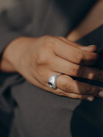 Model wearing Maancy contemporary silver ring with mirror dome design, lifestyle image showing the ergonomic fit and modern aesthetic.
