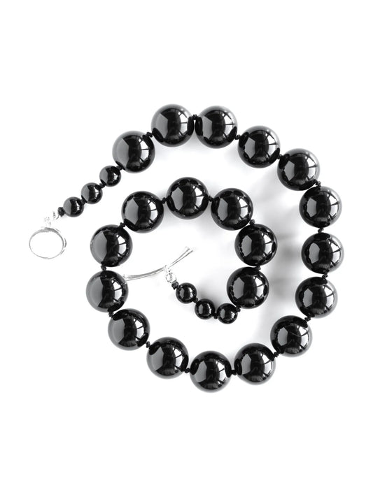 Complete Maancy black onyx Orb Collar necklace with sterling silver toggle clasp on white background, showing full graduated design.